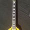 Good quality Electric Guitar with yellow colors and flybird shape by two pickups flying v electric guitar supplier