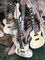 Skull Carving Body 6 Strings Electric Guitar in Matte Black Color supplier