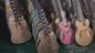 Skull Carving Body 6 Strings Electric Guitar in Matte Black Color supplier