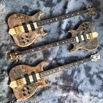 China Custom Alembics Grand Style Burst Maple Top 4 Strings Neck Through Body Electric Bass Guitar supplier