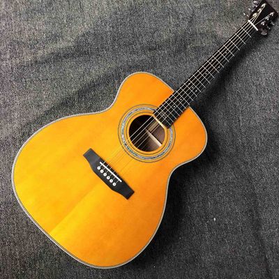 China Custom Solid Spruce Top Wood OM JM 14 Frets Acoustic Guitar Fishbone Binding supplier