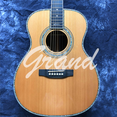 China Custom 40 Inch Solid Cedar OM Style Acoustic Guitar with Signature Ebony Fingerboard supplier