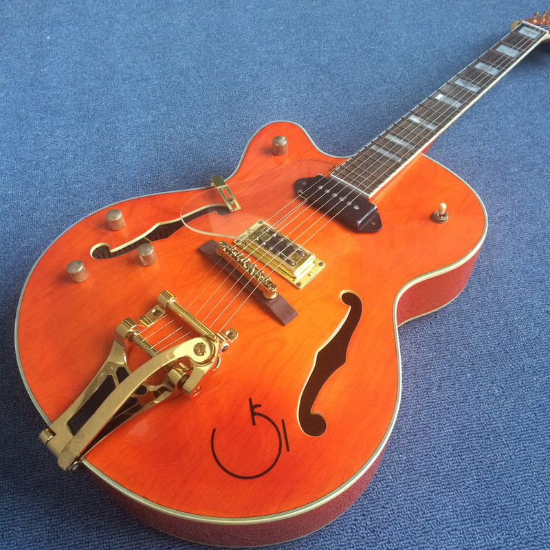 Hollow body jazz electric guitar, Double F holes,Ebony Fingerboard,Tremolo system,white guitar