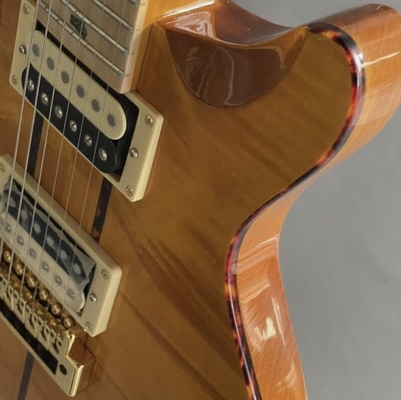 Custom Yellow Santana Retro Electric Guitar Flamed Maple Top Veneer HH Pickups Tremolo supplier