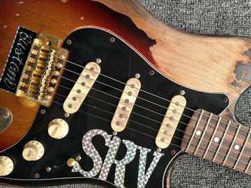 High Quality The new handmade remains ST SRV electric guitar,Do old electric guitar,Real photo,Free shipping supplier