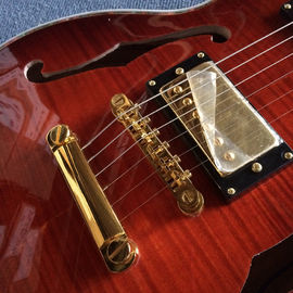 A new style of custom guitar, double F holes,Gold hardware,Flame Maple Top &amp; Back supplier