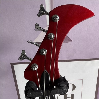 Custom 4 Strings Irregular Special Body Shape Electric Bass Guitar in Metallic Red ​Color Solid Body Maple Neck supplier