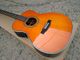 Orange color 28 Style classic acoustic guitar,Solid Spruce top,Abalone inlays Ebony Fretboard OM body acoustic Guitar supplier