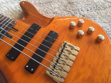6 string bass guitar JP2 yellow quilted maple body back and front Active pickups Golden bridges and tuner Alder with ebo supplier