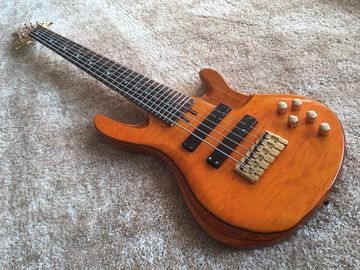 6 string bass guitar JP2 yellow quilted maple body back and front Active pickups Golden bridges and tuner Alder with ebo supplier