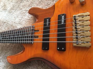 6 string bass guitar JP2 yellow quilted maple body back and front Active pickups Golden bridges and tuner Alder with ebo supplier
