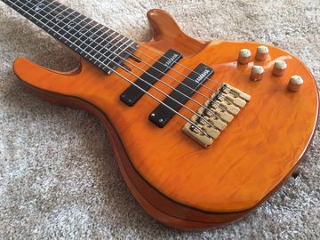 6 string bass guitar JP2 yellow quilted maple body back and front Active pickups Golden bridges and tuner Alder with ebo supplier