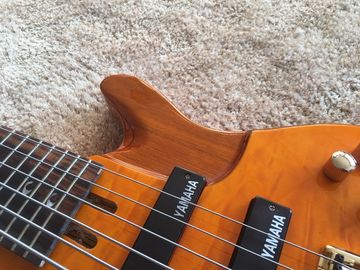 6 string bass guitar JP2 yellow quilted maple body back and front Active pickups Golden bridges and tuner Alder with ebo supplier