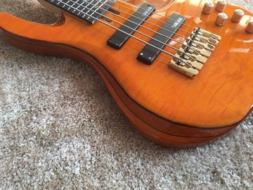 6 string bass guitar JP2 yellow quilted maple body back and front Active pickups Golden bridges and tuner Alder with ebo supplier