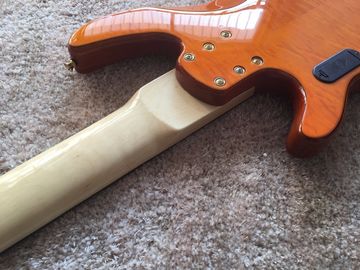 6 string bass guitar JP2 yellow quilted maple body back and front Active pickups Golden bridges and tuner Alder with ebo supplier