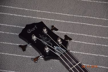 4 string bass guitar Cort GENE SIMMONS AXE Guitar High quality in stock and free shipping with low cost Factory supply d supplier