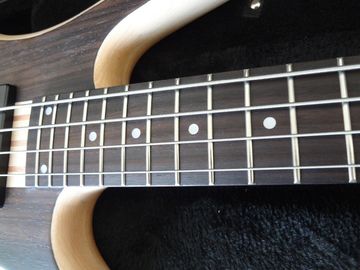 4 string bass guitar walnut wood top with Ash body Original bridges Neck through body MOP dot inlay on rosewood fretboar supplier