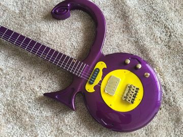 Custom guitar shop prince guitar Purple color boat anchor electric guitar with golden hardwares plastic pickguard supplier