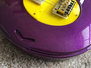 Custom guitar shop prince guitar Purple color boat anchor electric guitar with golden hardwares plastic pickguard supplier