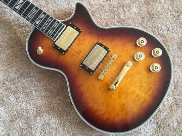 LP custom guitar tobacco sunburst quilted maple body Back contour and neck joint contour Ebony fingerboard custom guitar supplier