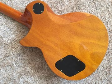LP custom guitar tobacco sunburst quilted maple body Back contour and neck joint contour Ebony fingerboard custom guitar supplier