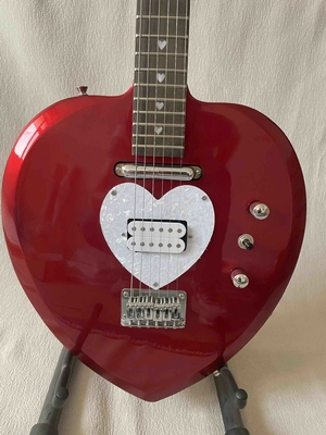 Custom Heart Shaped Electric Guitar in Black Short Scale Mahogany Body Humbucker Pickups Professional Guitar supplier