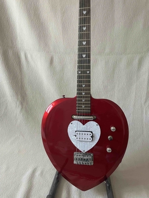 Custom Heart Shaped Electric Guitar in Black Short Scale Mahogany Body Humbucker Pickups Professional Guitar supplier