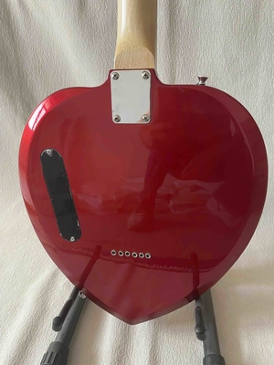 Custom Heart Shaped Electric Guitar in Black Short Scale Mahogany Body Humbucker Pickups Professional Guitar supplier