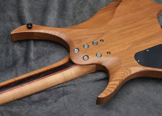2025 Fanned Frets 7 Strings Headless Electric Guitar supplier