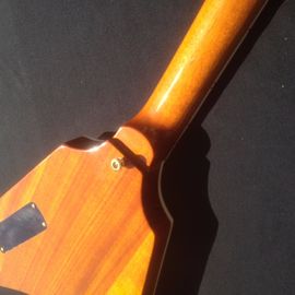 Good quality Electric Guitar with yellow colors and flybird shape by two pickups flying v electric guitar supplier