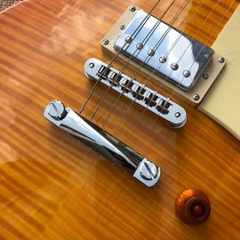 Custom one piece Neck one piece body electric guitar, Upgrade Tune-o-Matic bridge guitar Tiger Flame standard guitar supplier