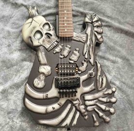 Skull Carving Body 6 Strings Electric Guitar in Matte Black Color supplier