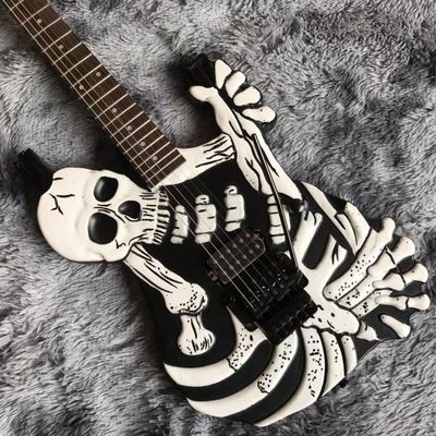 Top Quality 6 Strings Bones Black Skull Electric Guitar supplier