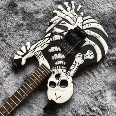 Top Quality 6 Strings Bones Black Skull Electric Guitar supplier