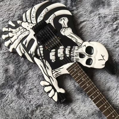 Top Quality 6 Strings Bones Black Skull Electric Guitar supplier