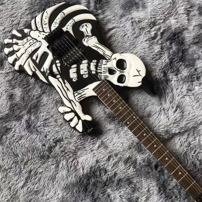 Top Quality 6 Strings Bones Black Skull Electric Guitar supplier