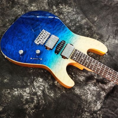 2021 New Style Flamed Maple Top Customized Electric Guitar in Blue Color supplier