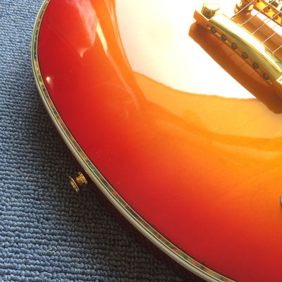 Custom Grand Solid Mahogany Body Electric Guitar in Cherryburst and with Gold Hardware supplier