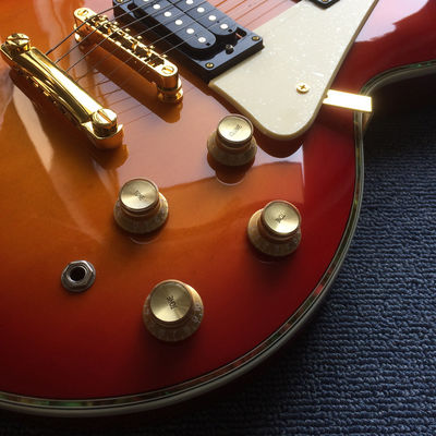 Custom Grand Solid Mahogany Body Electric Guitar in Cherryburst and with Gold Hardware supplier