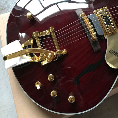 Custom Double Convex Surface Electric Guitar Big Tremolo in Wine Red supplier