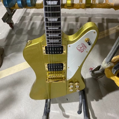 Custom Grand Firebird Style Electric Guitar in Golden Color with Gold Hardware Mahogany Body Rosewood Fingerboard supplier