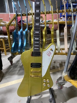 Custom Grand Firebird Style Electric Guitar in Golden Color with Gold Hardware Mahogany Body Rosewood Fingerboard supplier